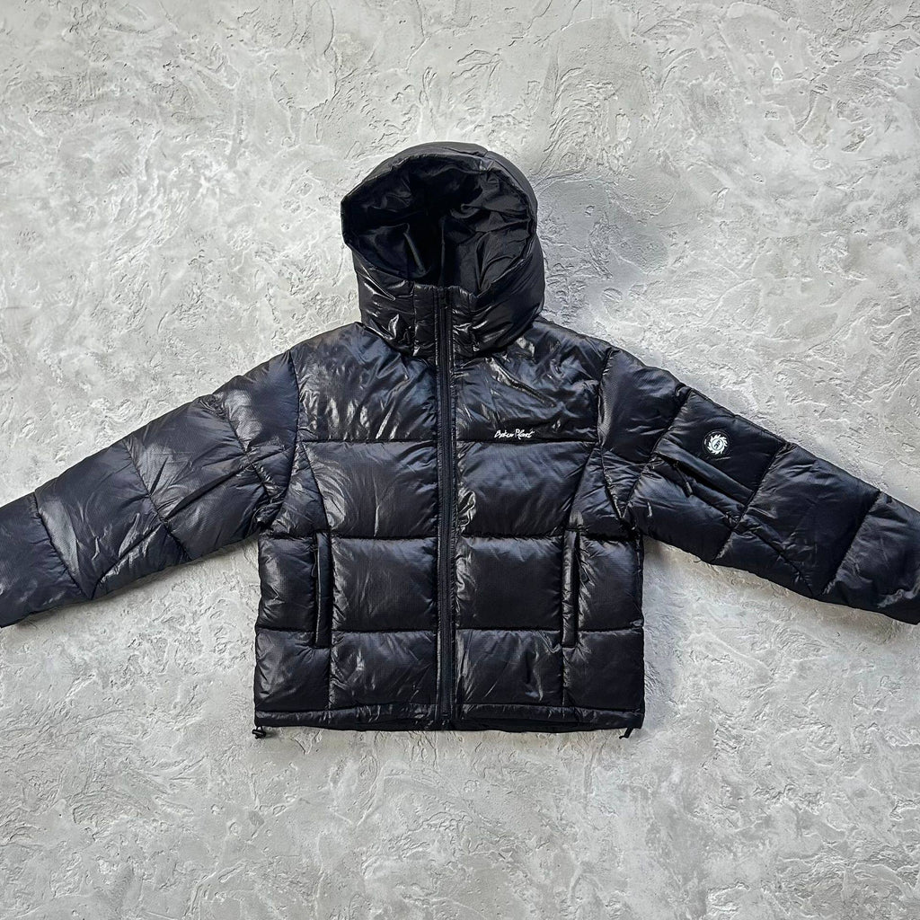 Chaqueta Puffer Broken Planet Plumas